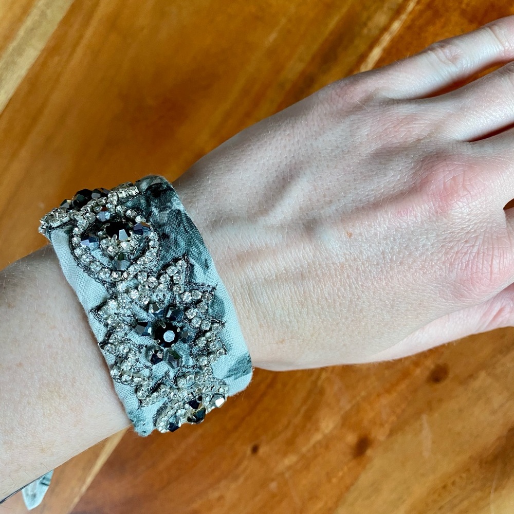 Bandana style bracelet with rhinestones.